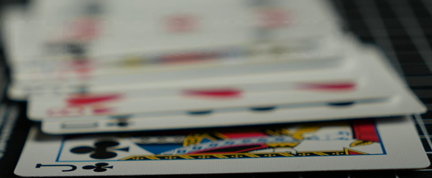Playing cards at different distances, with only the center cards in focus