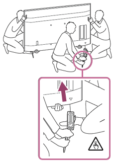 Image for removing the table-top stand from the TV