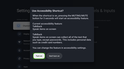 Pressing the MUTE button on the remote control to activate the Talkback function.