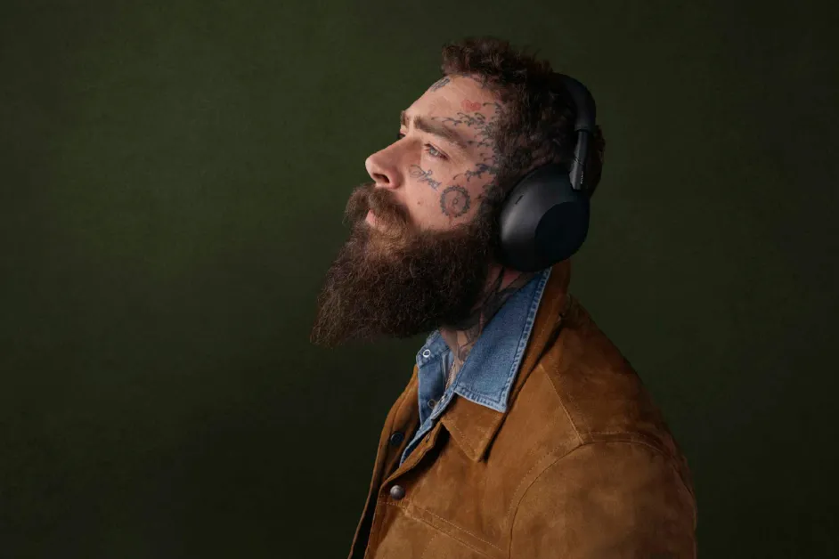 Person wearing WH Series over-ear headphones