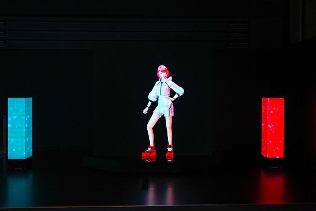 Three robots equipped with LED panels