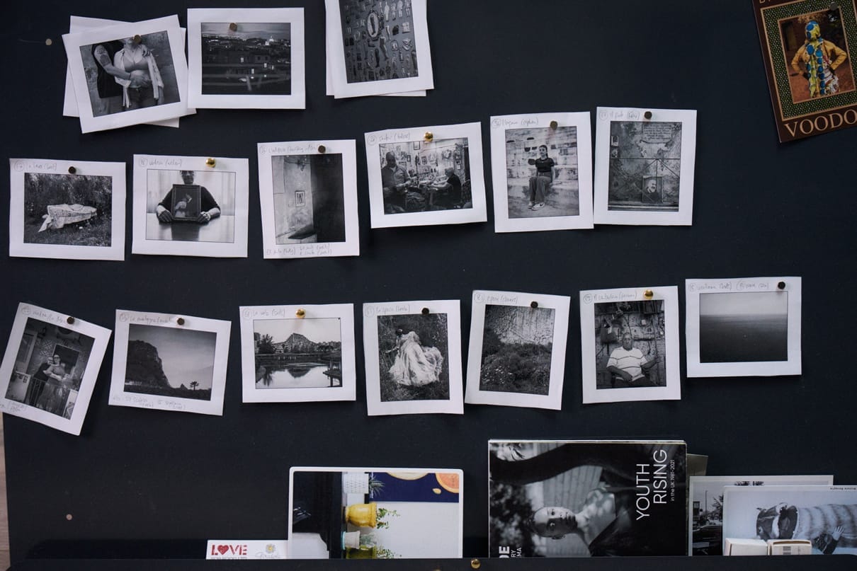 Board with multiple photos pasted on it