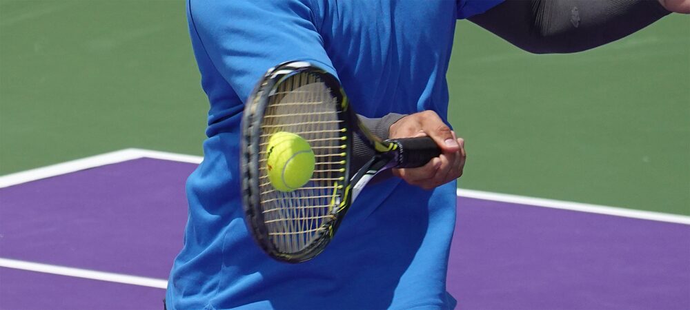 Fast-moving tennis action photographed to demonstrate the Sony RX100 VII shooting performance