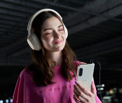 A woman listening to music