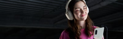 A woman listening to music